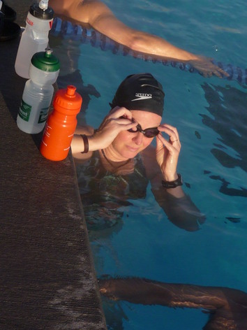 checking my goggles, getting ready to start the swim set