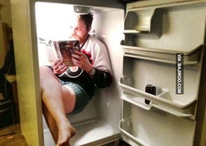 funny-guy-studying-book-in-fridge